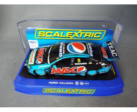 Scalextric - A 2014 Pepsi Max Crew Ford Falcon number 5 car driven by Mark Winterbottom. # C3582F. The car appears Mint in a 