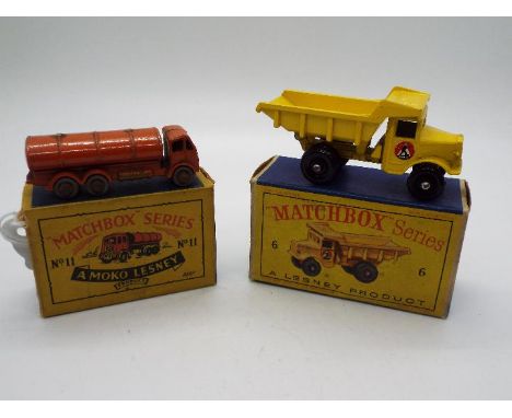 Matchbox, Lesney - Two boxed diecast model vehicles by Matchbox. Lot includes Matchbox  #11 ERF Road Tanker in red with gold 