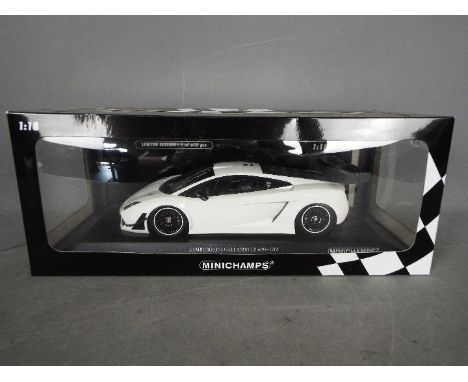 Minichamps - A boxed Limited Edition diecast 1:18 scale Lamborghini Gallardo LP600+ GT3. The model in white is one of 600 pie