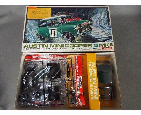 Matz - A boxed 1:16 scale motorised Matz #1200 Austin Mini Cooper S Mk.II plastic model kit. The kit appears in Mint conditio