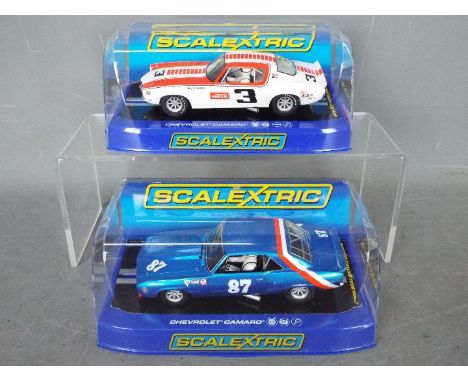 Scalextric - 2 x Chevrolet Camaro race cars, a 1969 Trans - Am series car driven by Jerry Peterson and a 1970 car driven by T