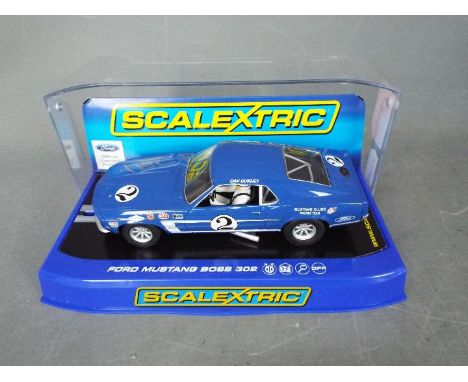 Scalextric - Ford Mustang Boss 302 number 2 car driven by Dan Gurney. # C3539. The car appears in Mint condition in a Very Go