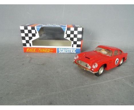 Scalextric - A vintage original 1960s Scalextric Aston DB4 GT model with sunroof. # C.68. The car appears in Very Good condit