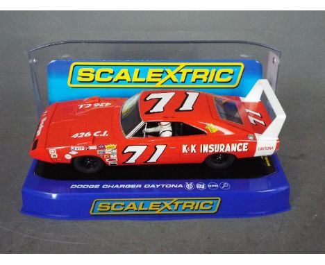 Scalextric - Dodge Charger Daytona number 71 car driven by Bobby Isaac in K&amp;K Insurance livery. # C3423. The car appears 