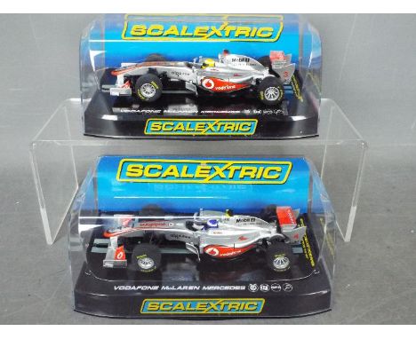 Scalextric - 2 x Vodafone McLaren Mercedes F1 cars, Lewis Hamiltons number 3 car and Jenson Buttons number 4 car. # C3165, # 