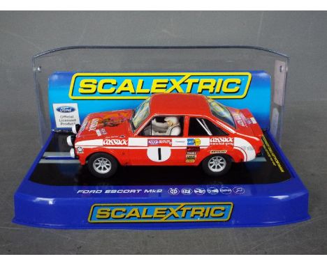 Scalextric - Roger Clark's 1975 Welsh Rally winning Ford Escort Mk2 in Cossack livery. # C3483. The car appears Mint in a Ver