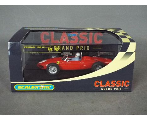 Scalextric - 1961 Ferrari 156 F1 Grand Prix car, # C2727. The model appears in Mint condition in a Very Good display case wit