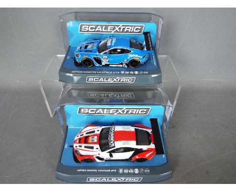 Scalextric - 2 x 2015 Aston Martin Vantage GT3 cars, the number 68 car in Massive Motorsport livery and the number 007 car in