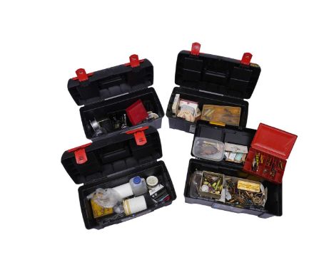 Four fishing tackle boxes, containing a selection of fishing tackle, including: a House of Hardy fly line; a large selection 