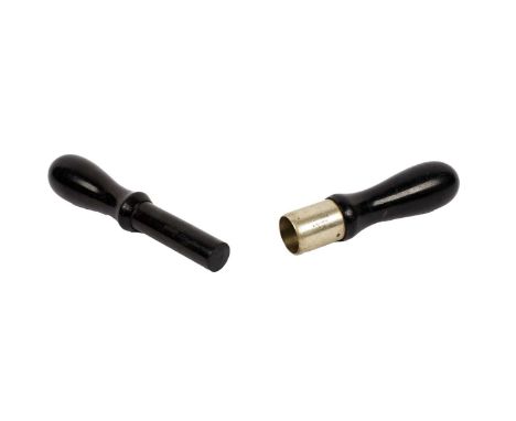 A J. Purdey &amp; Sons 12 bore roll-turnover tool and wad tamper, both stamped with gauge and maker.