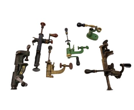 Cartridge making tools, to include: a 12-gauge bench-mounted cartridge reloading machine by Jeffries Norwich Pat. 1900, a sim