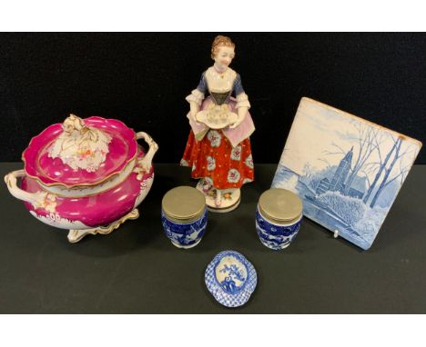 A German figure, of a lad holding a tray, 23cm high;   a Grainger and Co blue and white vase;  a Samuel Alcock two handled su