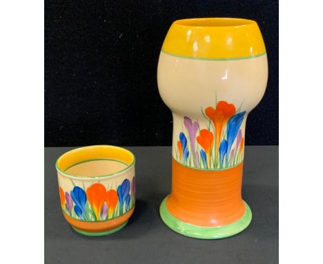 A Clarice Cliff Crocus pattern vase, 19cm high, printed mark;  a similar small vase (faults) 