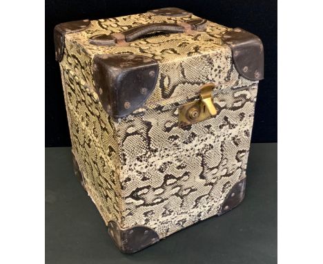 Biba  - a tall narrow luggage trunk with snake effect exterior and leather handle, red lined interior, with a label inside Bi