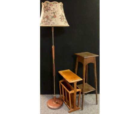 A Retro 1960's / 70's mahogany and brass standard lamp;  a mid-20th century oak pot stand;  an oak magazine rack;  occasional