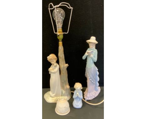 Figures - Lladro lady reading a book; others; Lladro 1989 Christmas Bell;  similar unmarked table lamp etc 