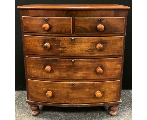 A Victorian mahogany bow-front chest of two short over three long graduated drawers, 111cm tall x 94cm wide x 52.5cm deep. 