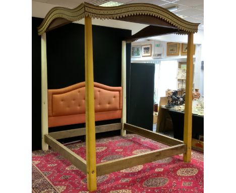 A painted four poster super king size double bed, arched carved and painted top rails, tapering fabric block columns, button 