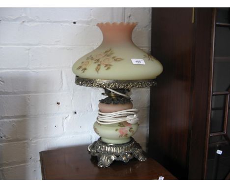 A reproduction cast metal table lamp with glass shade 