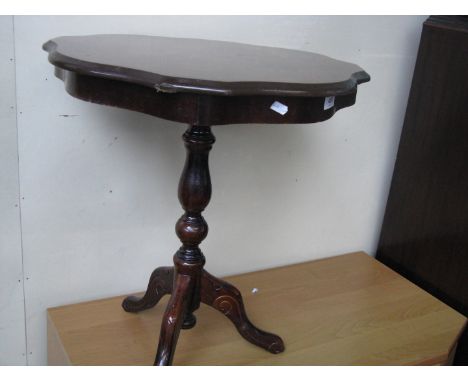 An Italian style tripod table 