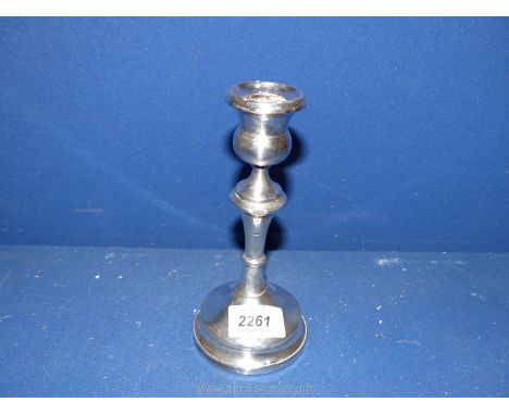 A silver candlestick, Birmingham 1919, makers 'M&amp;J' (Marson &amp; Jones). Some dents, 7" tall, 278g.