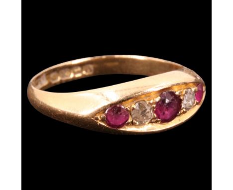 A Victorian five-stone ruby, diamond and 18 ct gold dress ring, comprising three graded old-cut rubies of approx 0.3 ct aggre
