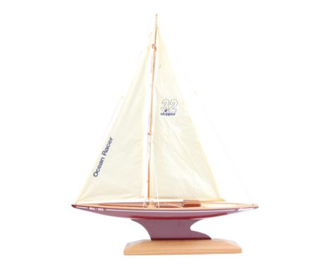 A "32 Skipper Ocean Racer Sea-Zel" wood and resin scale model pond yacht, on wooden stand, 79 cm x 97 cm 