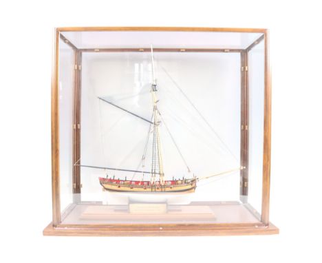 A scale model boat "HM Cutter Lady Nelson", in glazed case, early 21st Century, 60 cm x 29 cm x 55 cm