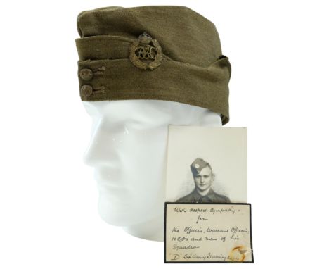 A 1940 dated British Army Field Service Cap bearing a Royal Armoured Corps cap badge, together with a related photograph and 