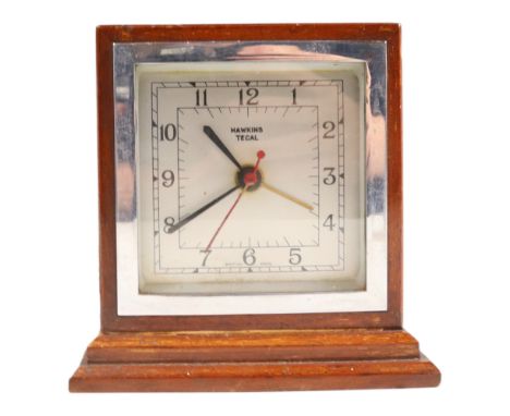 An Art Deco influenced Hawkins Tecal chromium electroplate and mahogany electric mantle clock, 14 cm x 9 cm x 14 cm