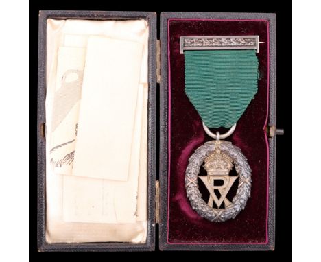 A cased Victorian silver and silver-gilt Volunteer Officers Decoration, London, R &amp; S Garrard &amp; Co, 1893, together wi