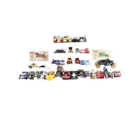 A collection of plastic-kit-built scale model cars, motorcycles, etc