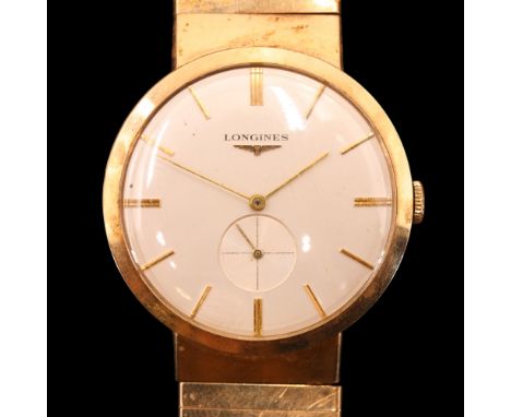 A 1950s Longines 9 ct gold dress wristwatch, having a calibre 19.4 manual-wind movement and frosted silver face with gilt bat