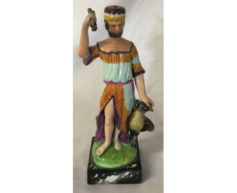 Staffordshire ceramic figure of a man holding a bundle of sticks next to an eagle on a marble effect plinth Ht 28cm