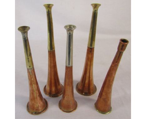5 copper hunting horns inc one by Swaine &amp; Adeney, Picadilly London Proprietors of Kohler &amp; Sons