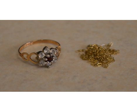 9ct gold cubic zirconia dress ring and a small 9ct gold chain, total approx weight 1.47g 