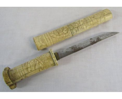 Oriental carved bone handled dagger with scabbard