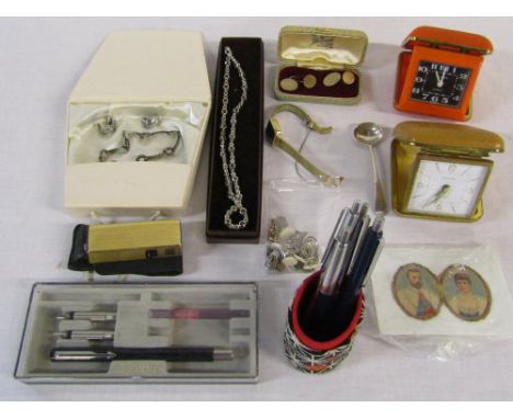 Selection of pens, silver caddy spoon, Ronson lighter, travel clocks and costume jewellery etc