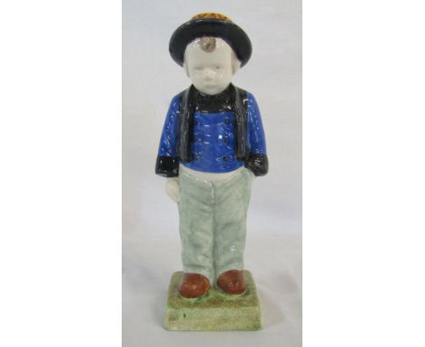 H B Quimper figure of a young boy, designed by Berthe Savigny (chips to base and hat) H 25.5 cm
