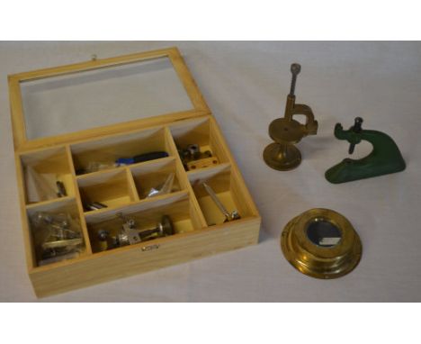 2 watchmakers staking tools, cockpit/dashboard pocket watch case and a box of watchmakers parts (possibly from a lathe)