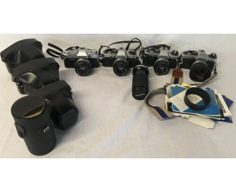 3 Olympus OM10 35mm camera &amp; a OM30 with 3 Olympus cases &amp; an Olympus zoom &amp; close focus lens