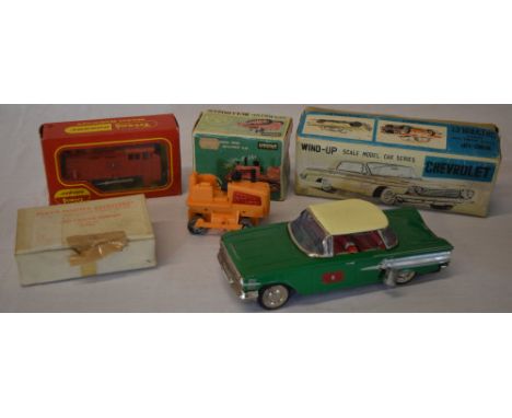 Hornby Triang boxed model, vintage boxed tinplate wind up Chevrolet Impala, clockwork tractor etc 