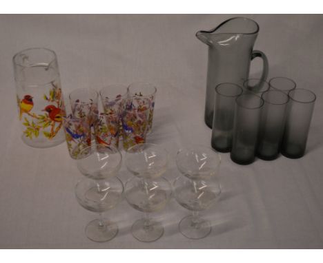 2 sets of glass water jugs with 6 glasses and 6 vintage sparkling wine glasses