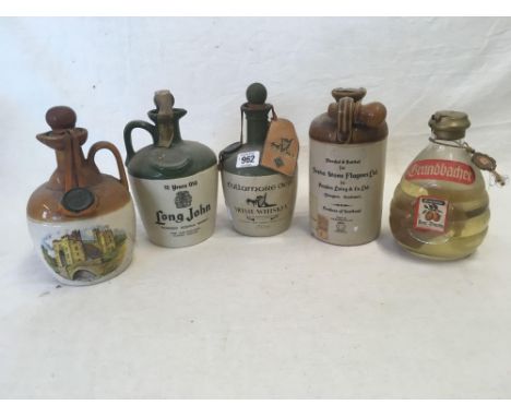 3 STONE JAR BOTTLES OF IRISH &amp; SCOTCH WHISKY I OF IRISH MEAD &amp; 1 GLASS BOTTLE OF PEAR BRANDY