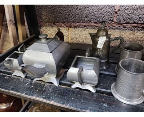 SHELF OF MISC PEWTER WARE, TANKARDS &amp; INCL; 3 PIECE TEA SET