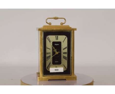 Koperen reis- of bureauklokje, aquartz Japans. - Copper travel or desk clock, aquartz Japanese.
