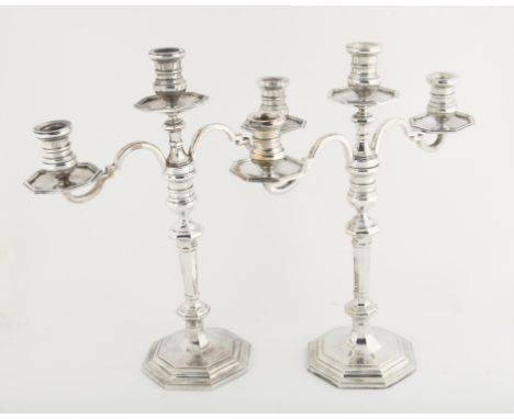 Pair of modern silver three light candelabra with scrolling  arms on octagonal bases, by Harrods Ltd, 109.88oz 3417.5gm, H27.