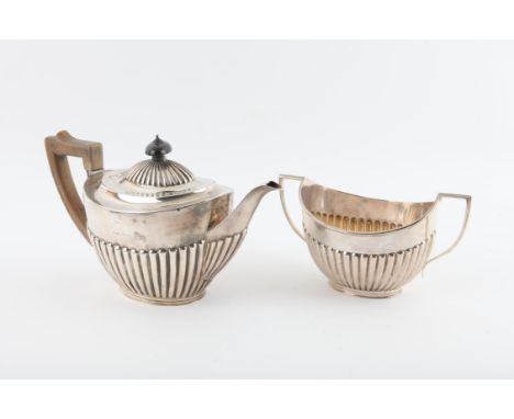 Victorian silver matching teapot and sugar bowl with half-gadrooned bodies, by Roberts & Belk, Sheffield, 1885/6, gross weigh