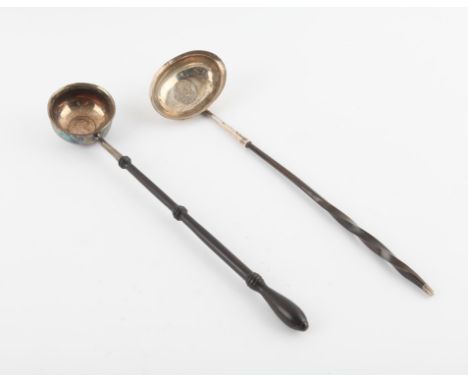George III silver whalebone handled punch ladle, London, probably 1801, and another with a turned wooden handle, (2), 