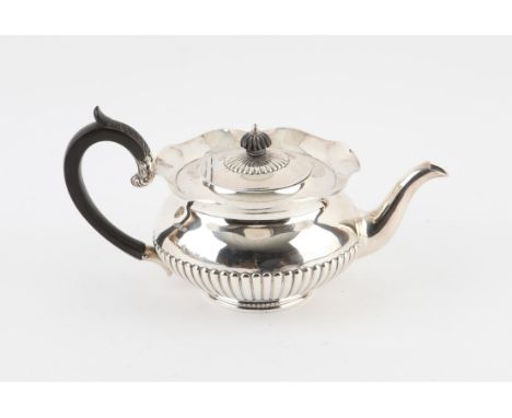 George V silver teapot with wavy rim and half-gadrooned body, by Mappin & Webb, Sheffield, 1915, gross weight 23oz, 715g,